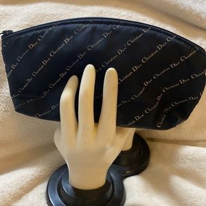 CHRISTIAN DIOR navy blue and white zippered travel and beauty essentials bag!